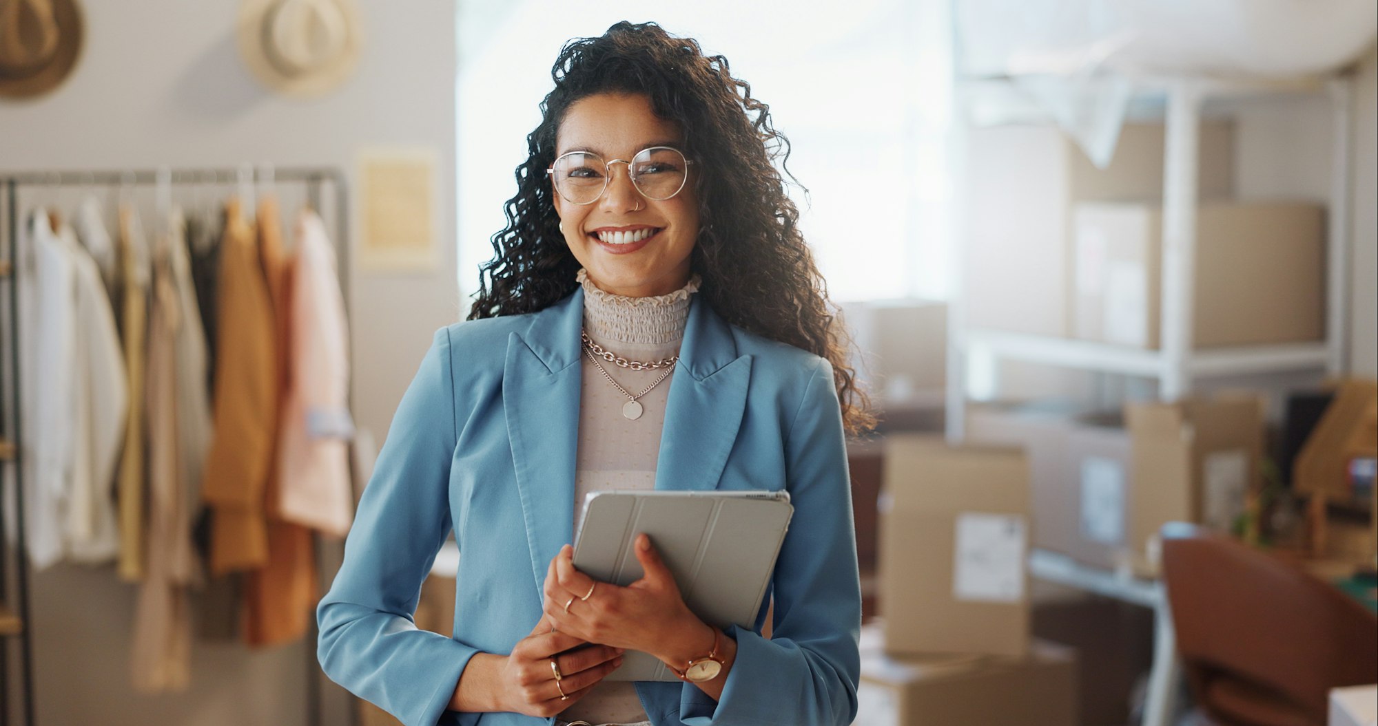 Portrait, boxes and woman with a tablet, ecommerce and smile with connection, internet and delivery